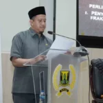 Ketua Fraksi PKS DPRD Kabupaten Sukabumi Amran Munawar Luthpi saat menyampaikan jawaban Fraksi terhadap Pendapat Bupati atas Raperda tentang Hak Disabilitas dalam Rapat Paripurna, Jumat (16/6/2023). (Sumber : Istimewa)